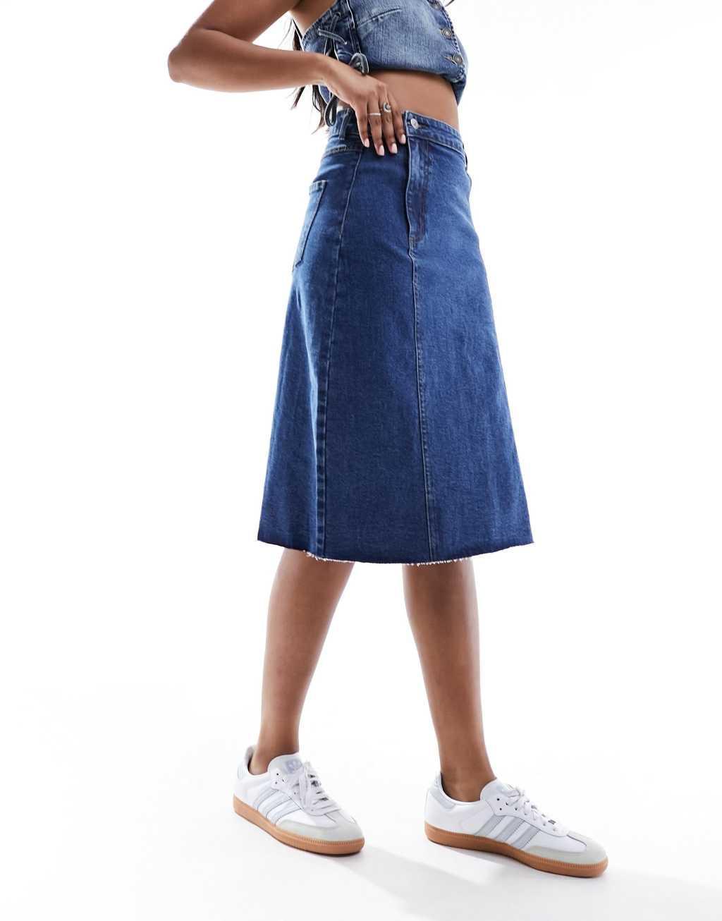 Urban Bliss y2k seam detail raw edge knee length skirt in mid wash blue Product Image