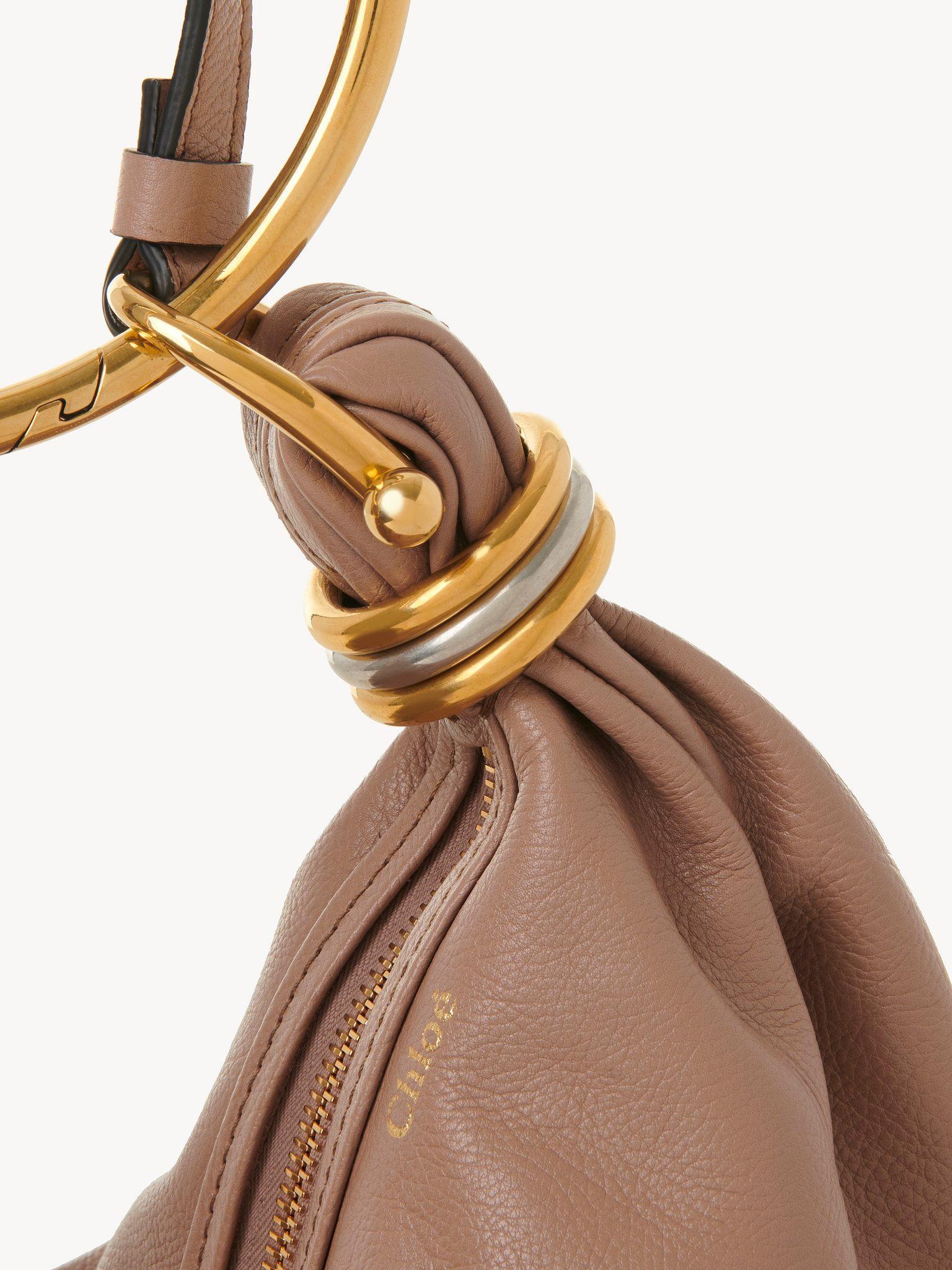 Small Bracelet Hobo bag in grained leather Product Image