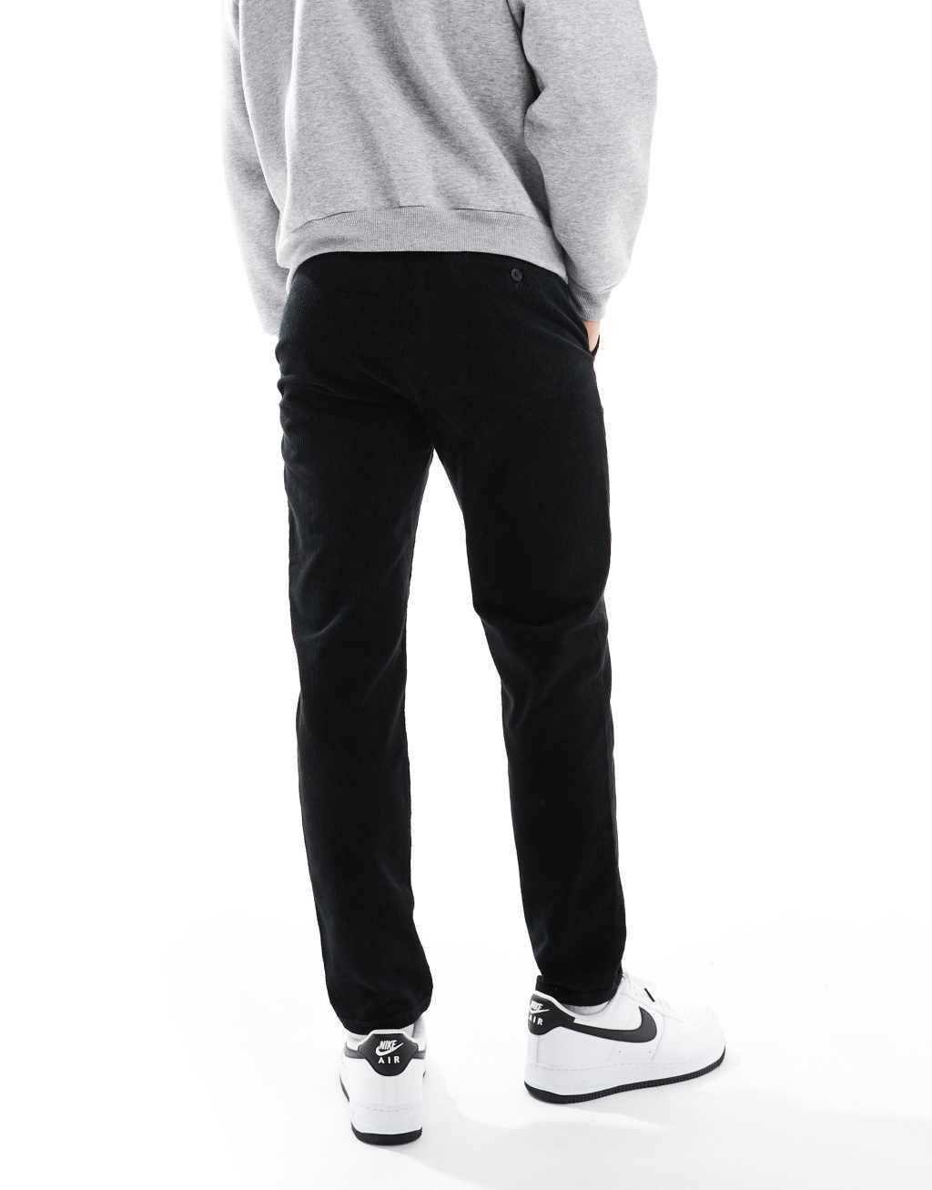 ONLY & SONS tapered corduroy pants in black Product Image