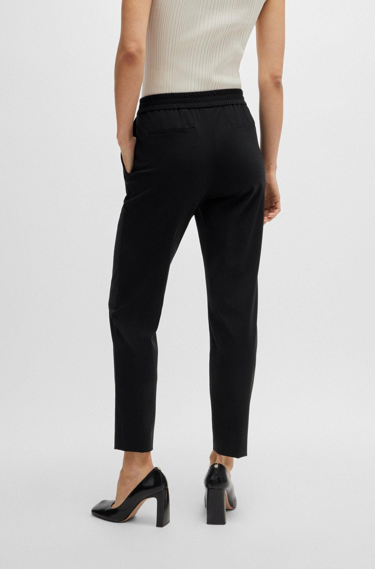 Slim-fit trousers in performance-stretch jersey Product Image