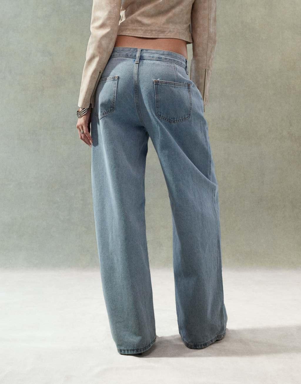 Lioness low rise adjustable waist wide leg jeans in light blue wash Product Image