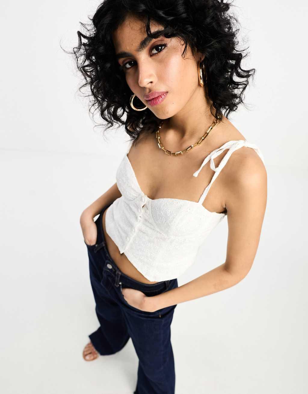 NA-KD x Chloe Schuterman eyelet corset top in white  Product Image