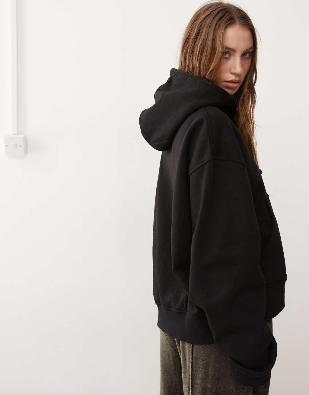 Weekday Essence boxy zip thru hoodie in black Product Image