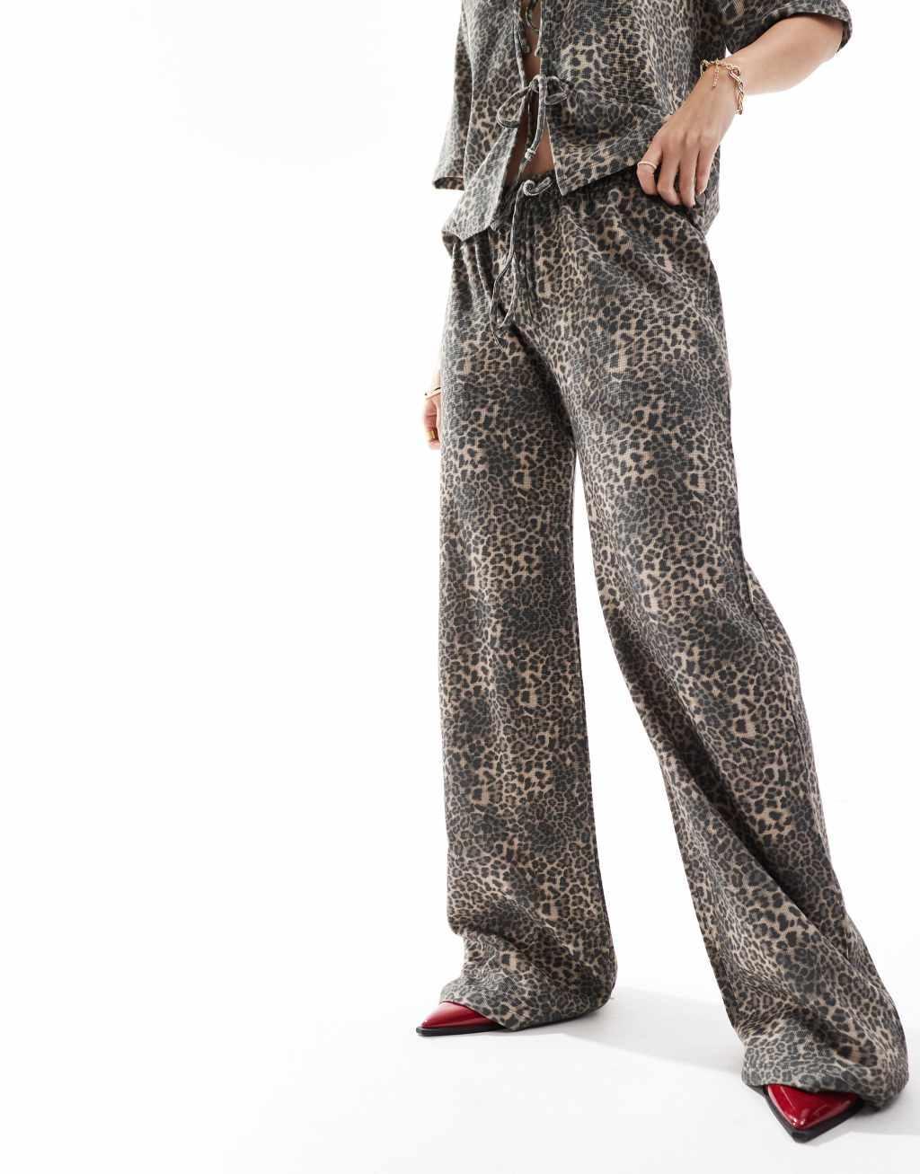 ASOS DESIGN wide leg pants in leopard Product Image