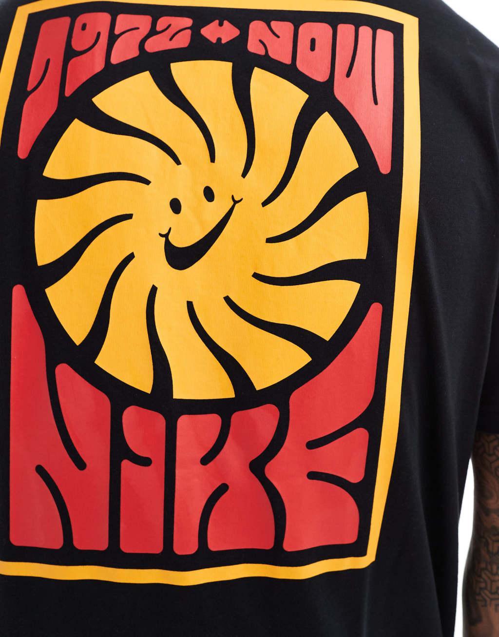 Nike festival back print T-shirt in black Product Image