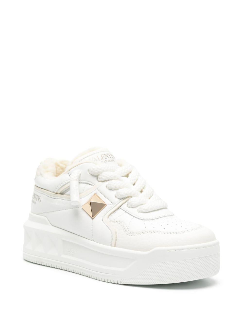 Roman Stud Leather Sneaker In White Product Image