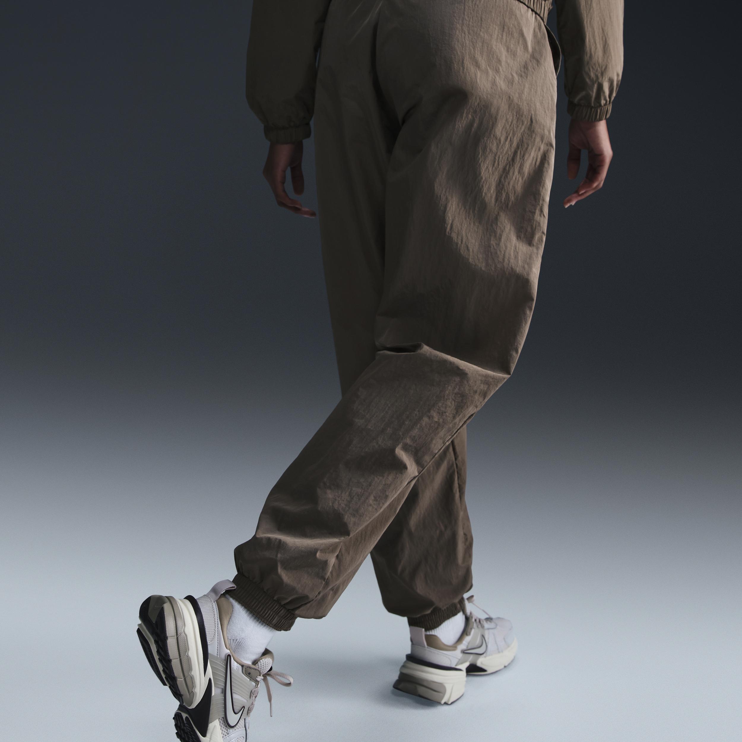 Women's Nike Sportswear Essential Mid-Rise Oversized Woven Jogger Pants Product Image