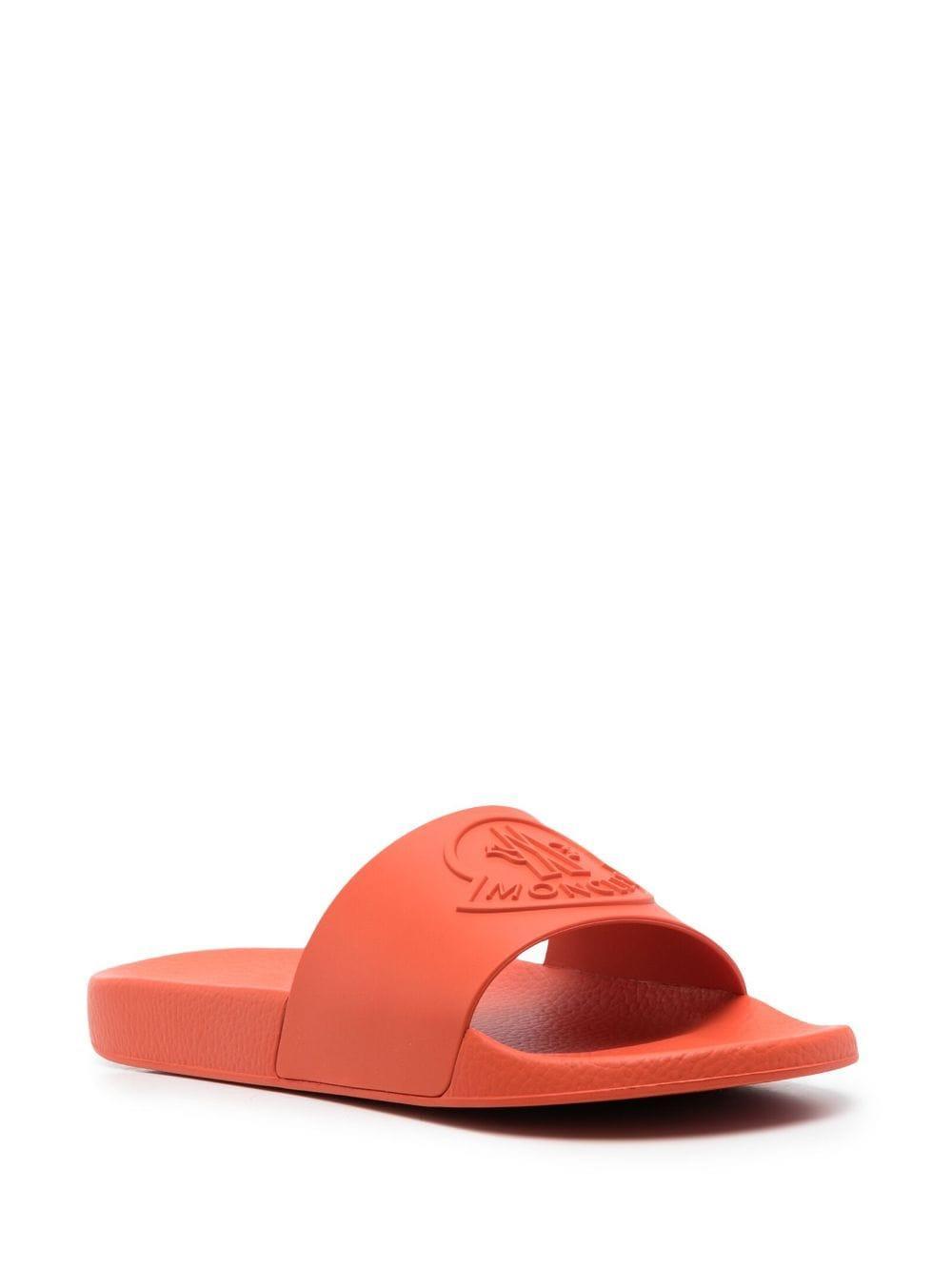 Jeanne Logo Embossed Slides In Orange Product Image