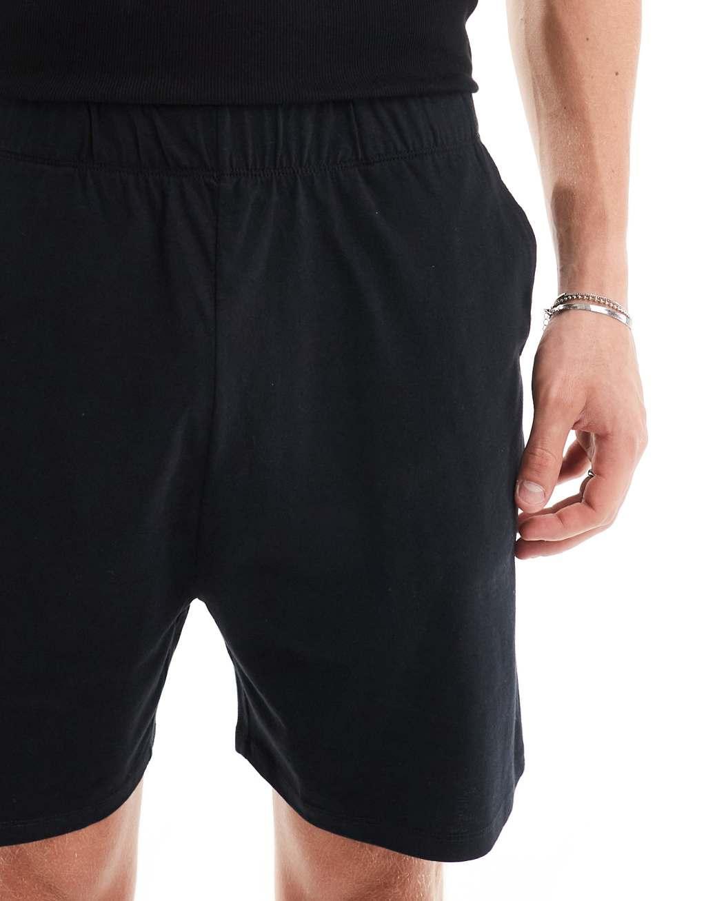 ASOS DESIGN jersey lounge shorts in black Product Image