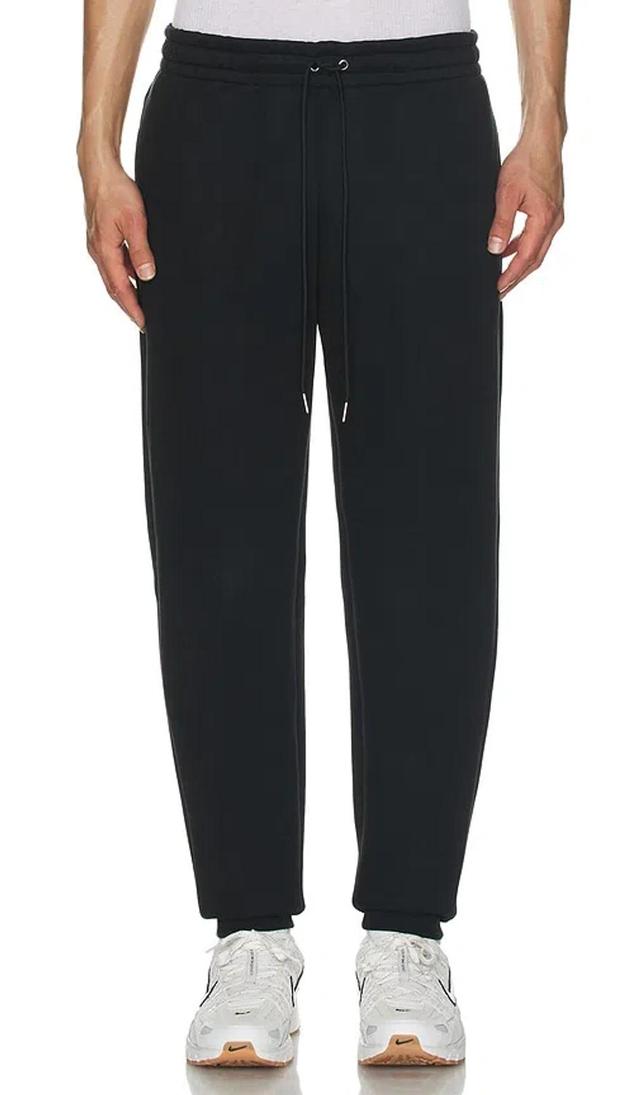 NIKE Reimagined Fleece Pants. - In Black Product Image