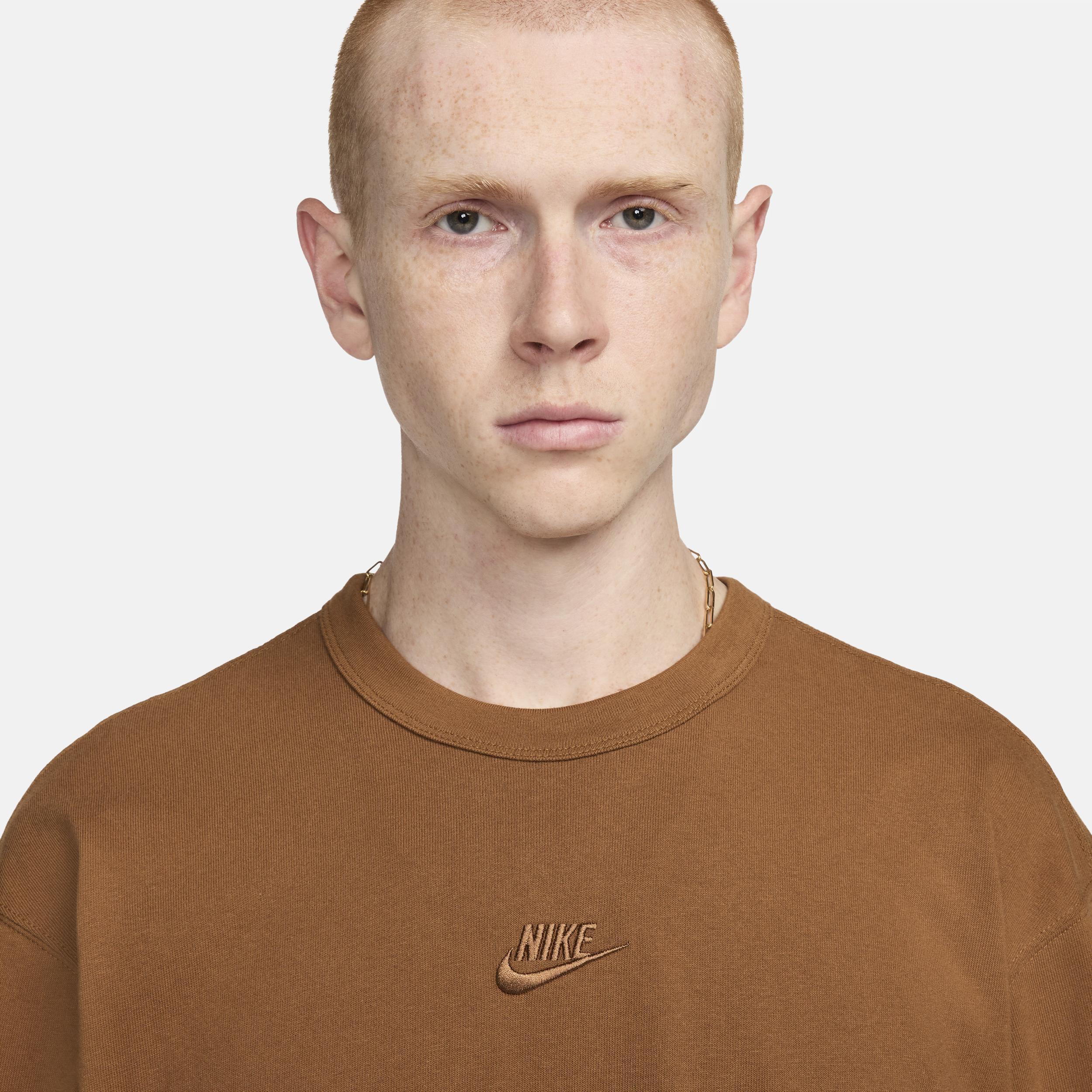 Nike Premium Essentials unisex oversized T-shirt in brown Product Image