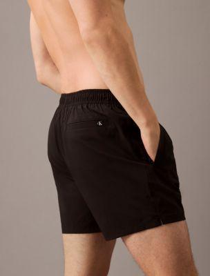 Logo Badge Solid Swim Shorts Product Image