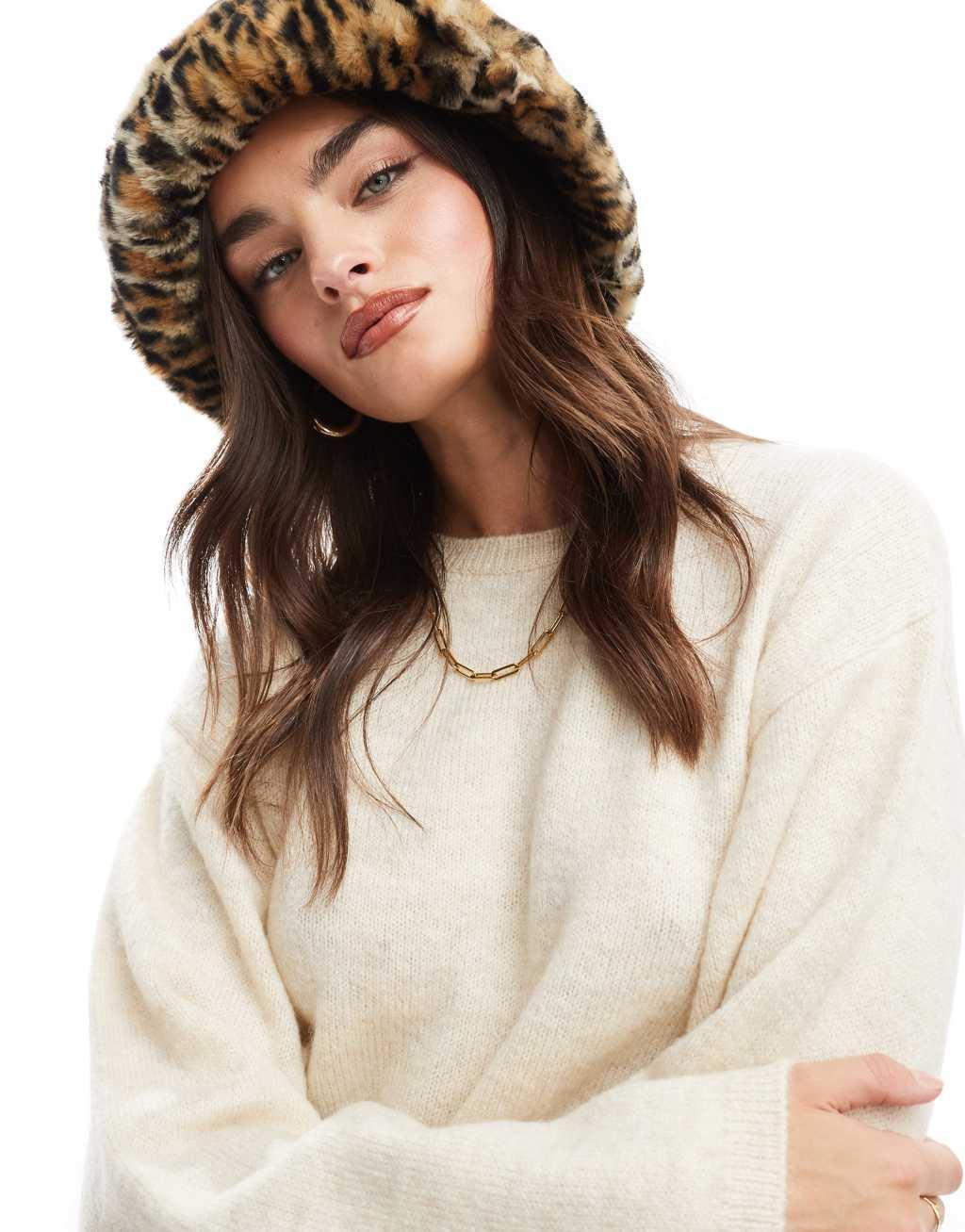 ASOS DESIGN faux fur bucket hat in leopard design Product Image