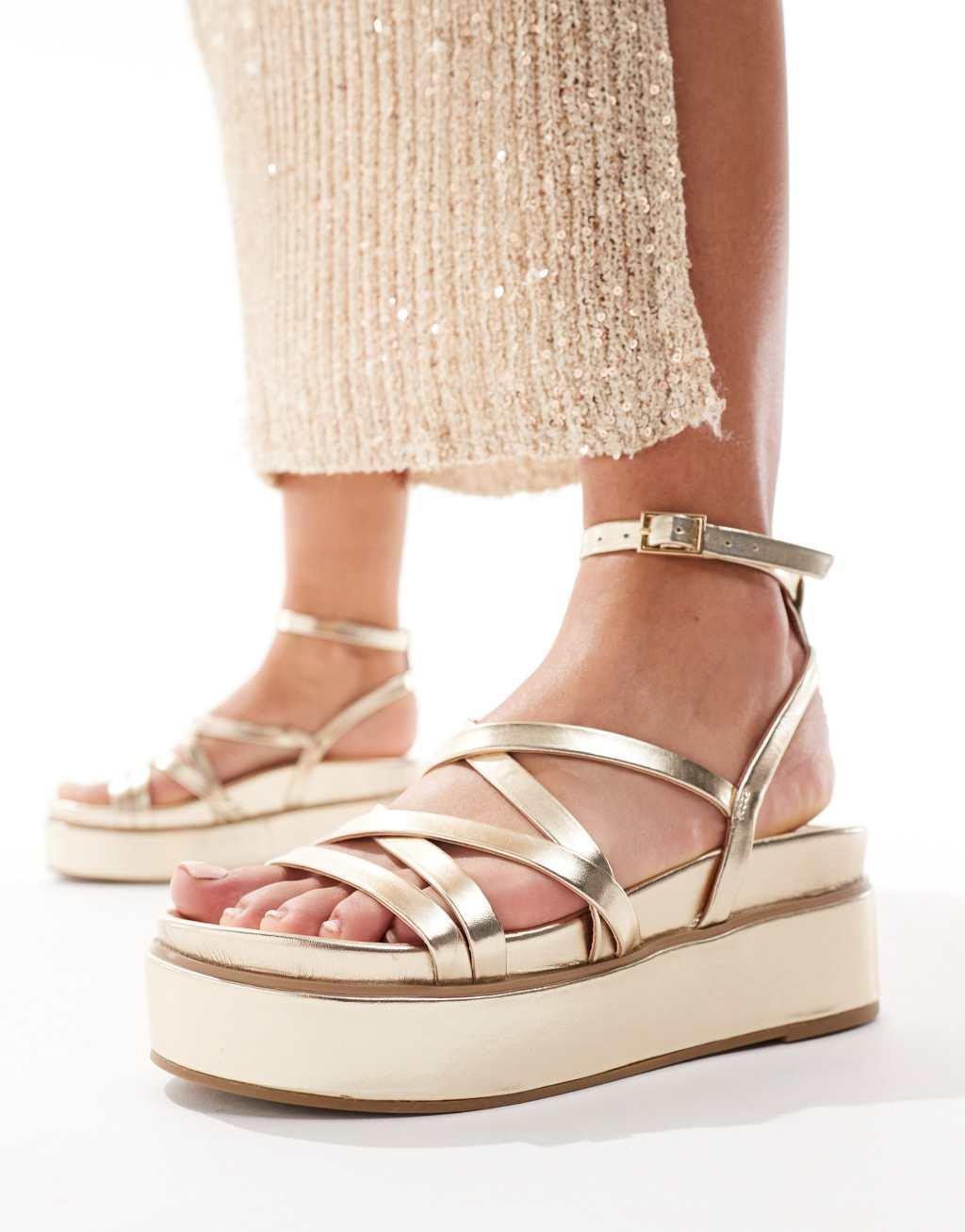 ASOS DESIGN Taurus 2 strappy flatform sandals in gold Product Image