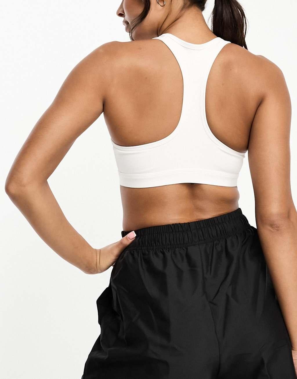 Nike Training swoosh medium support sports bra in white Product Image