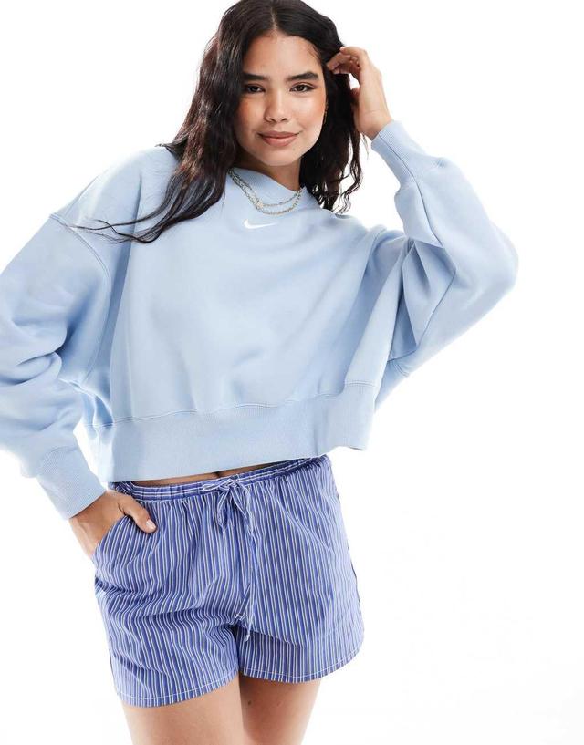 Nike Phoenix Fleece oversized cropped sweatshirt in light blue Product Image