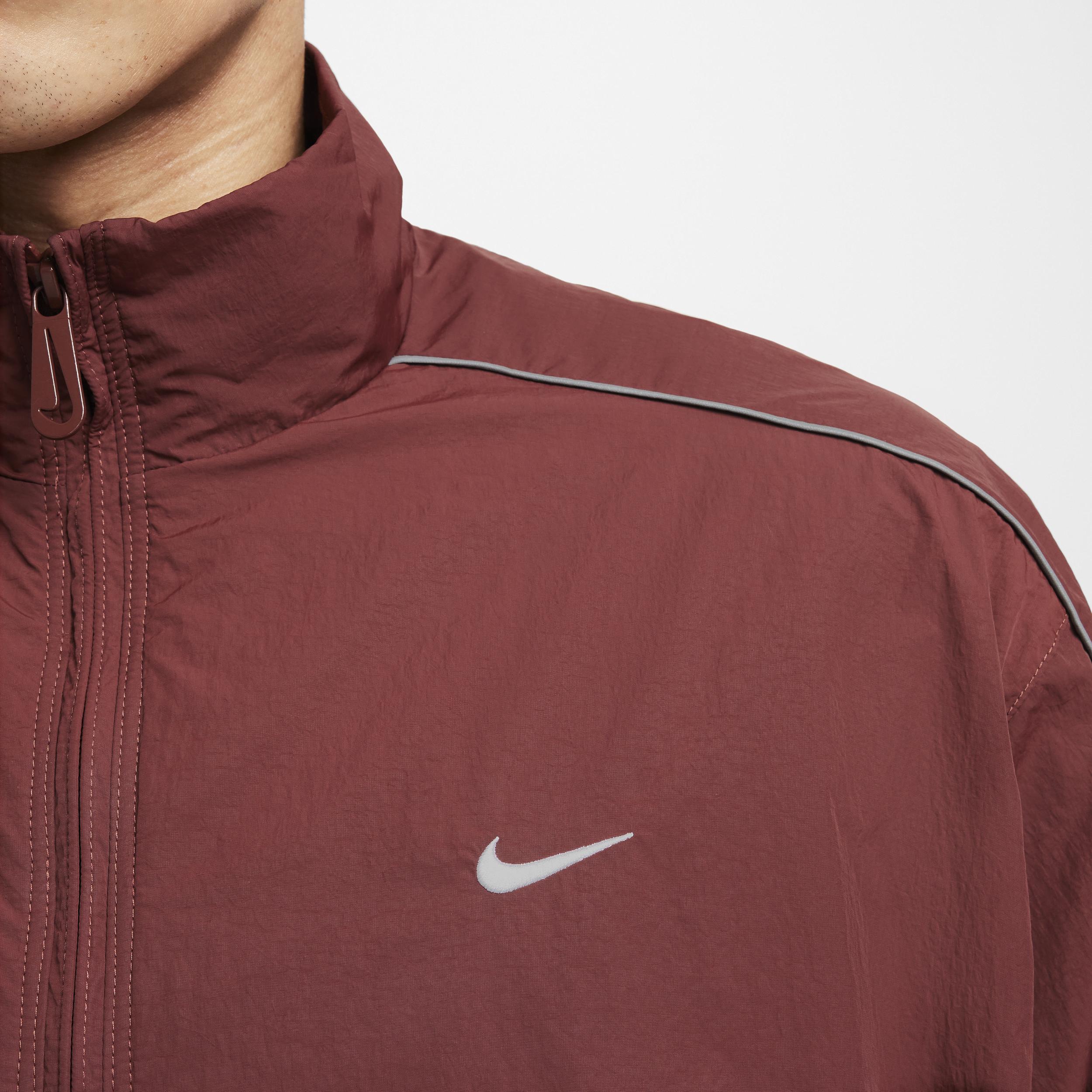 Men's Nike Sportswear Solo Swoosh Woven Track Jacket Product Image