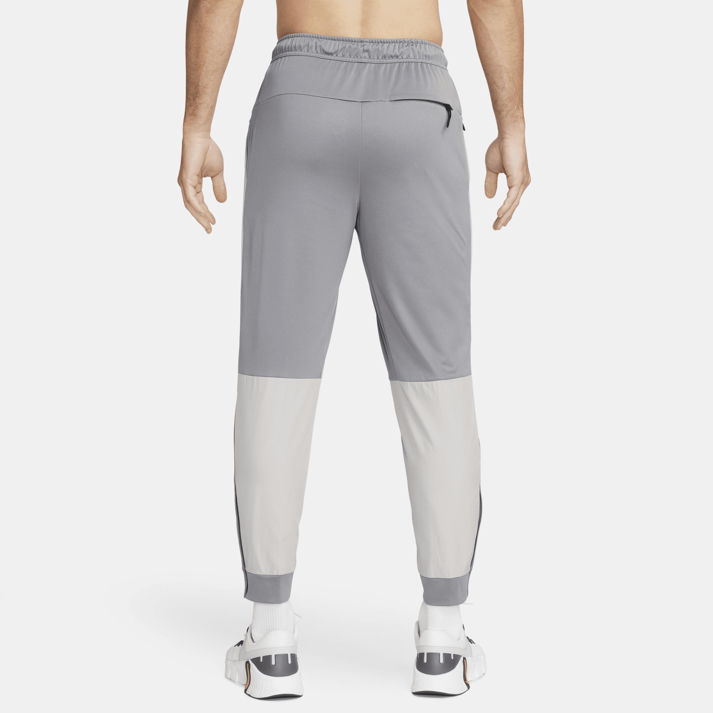 Nike Mens Unlimited Water-Repellent Tapered Versatile Pants Product Image