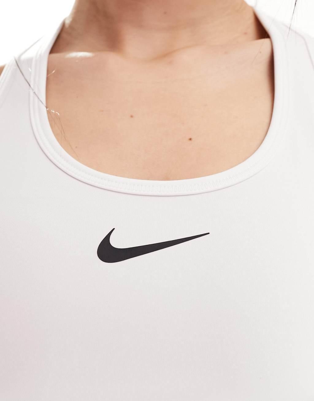 Nike Training swoosh medium support sports bra in white Product Image