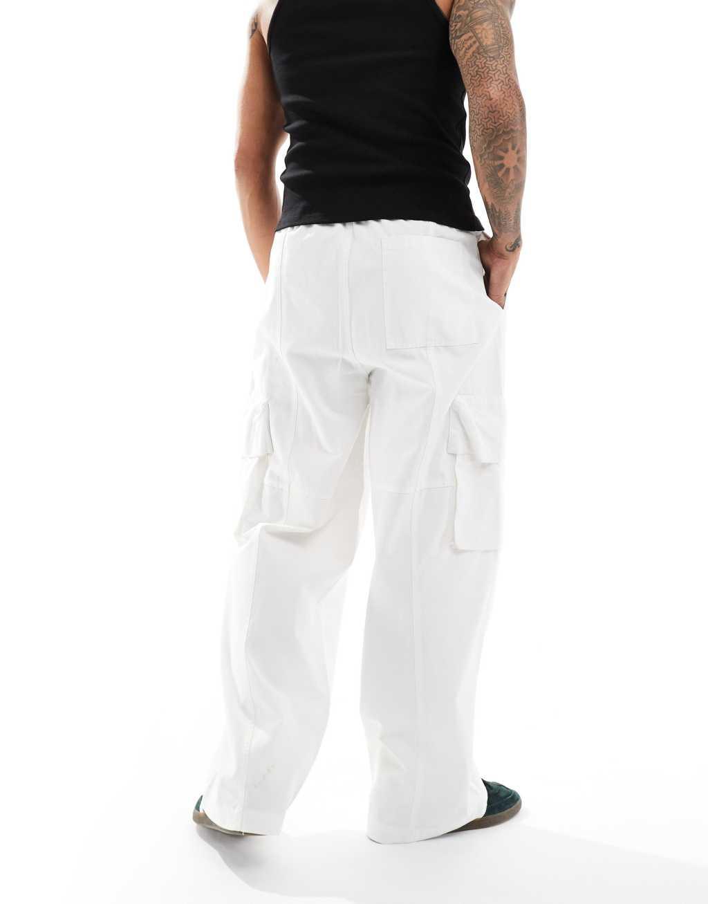 ASOS DESIGN super baggy cargo pants with panel details in ecru Product Image