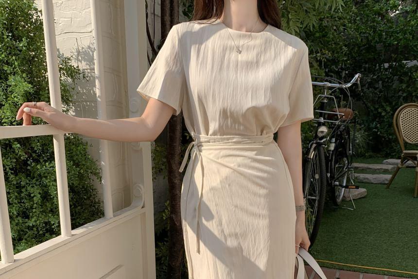 Short-Sleeve Round Neck Plain Asymmetrical Sashed Midi A-Line Dress Product Image