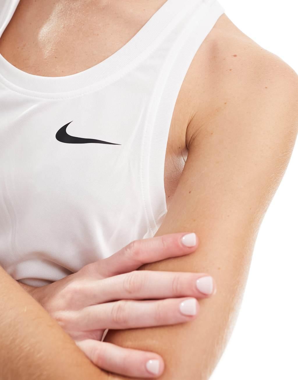 Nike Training Dri-FIT tank top in white Product Image