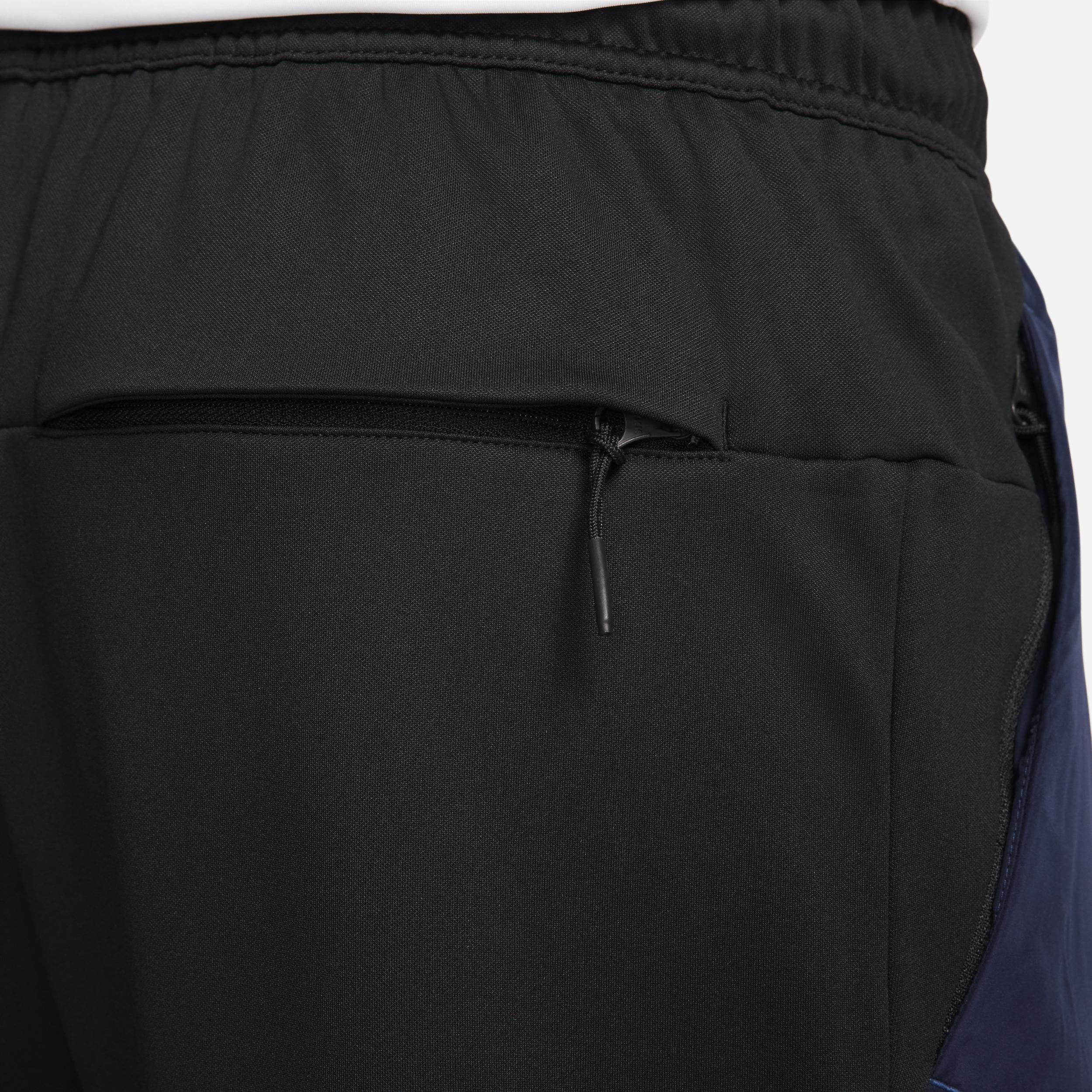 Nike Men's Unlimited Water-Repellent Zippered Cuff Versatile Pants Product Image