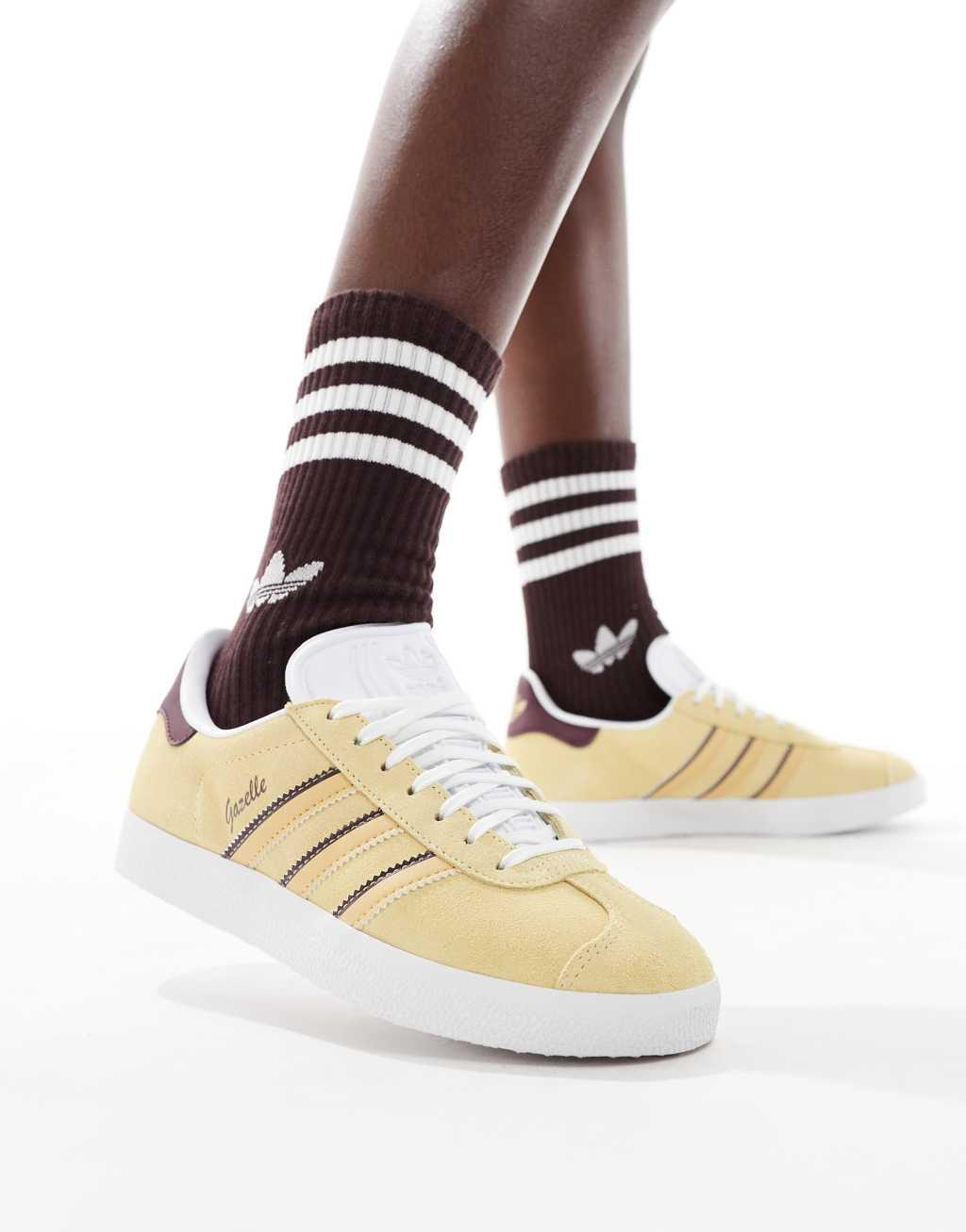 adidas Originals Gazelle sneakers in yellow and burgundy Product Image