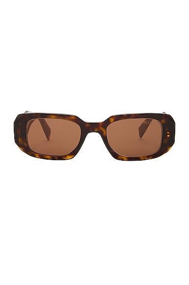 Prada Oval Frame Sunglasses in Brown. Product Image