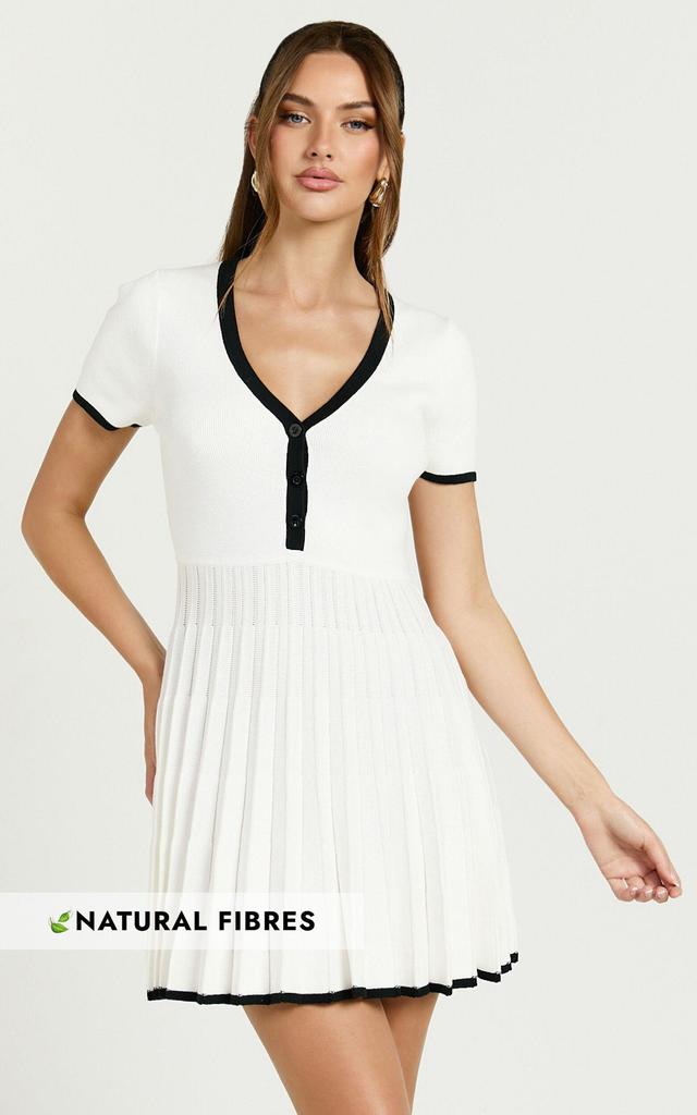 Vivienne Mini Dress - Short Sleeve Pleated Skirt Knitted Dress in Cream Product Image