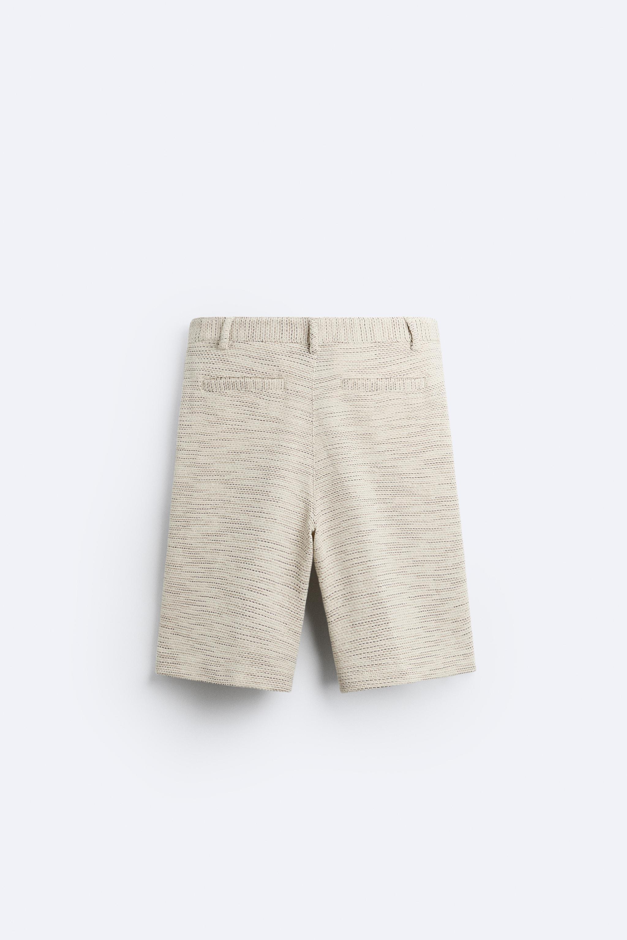 TEXTURED WEAVE RUFFLED SHORTS Product Image