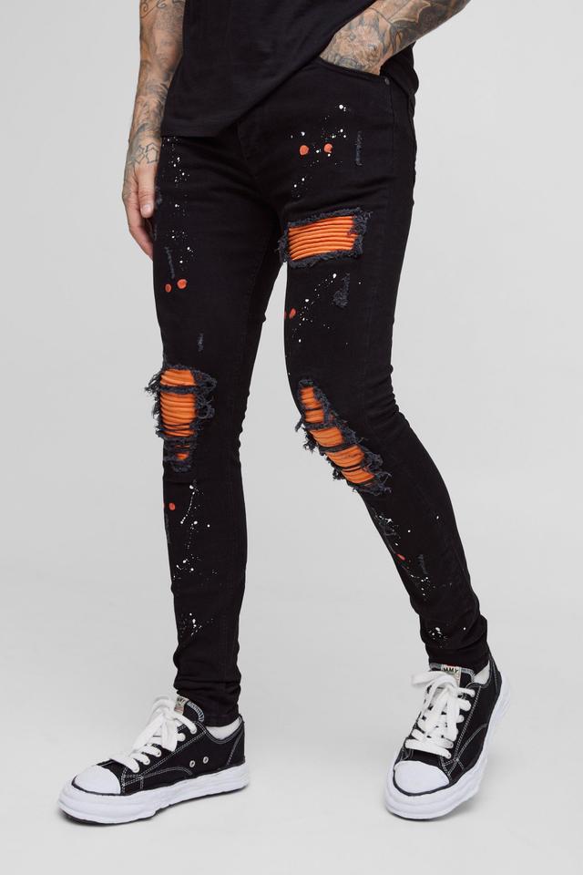 Tall Super Skinny Stretch Biker Rip & Repair Paint Splat Jeans | boohooMAN USA Product Image