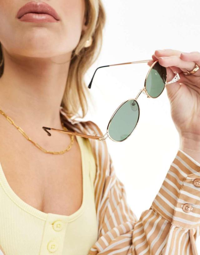 ASOS DESIGN metal oval sunglasses in gold  Product Image