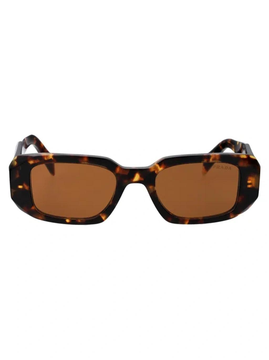 Sunglasses 0 Pr 17 Ws Vau2 Z1 In Brown Product Image