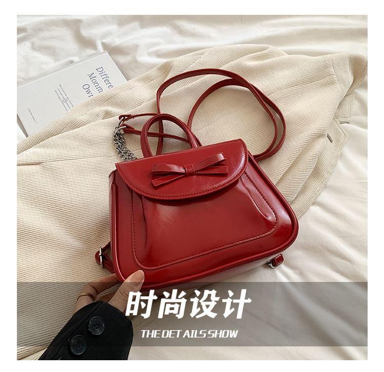 Faux Leather Bow Flap Crossbody Bag Product Image