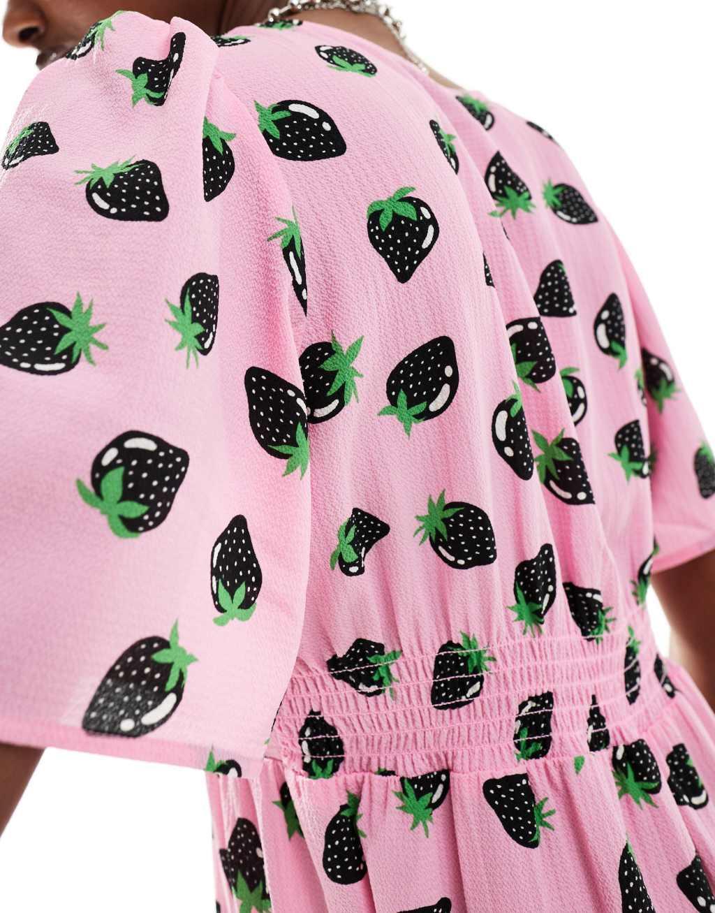 Monki short sleeve mini sun dress with v neck in pink and black strawberry print Product Image