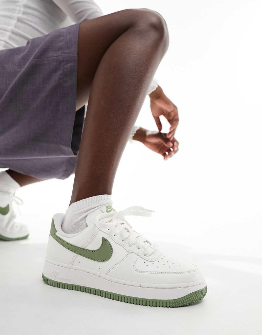 Nike Air Force 1 sneakers in white and green  Product Image