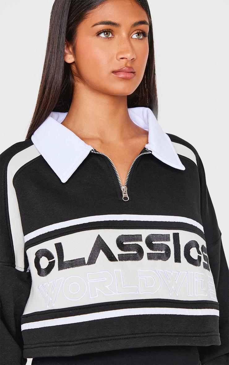 Black Classics Embroidered Half Zip Cropped Sweatshirt Product Image