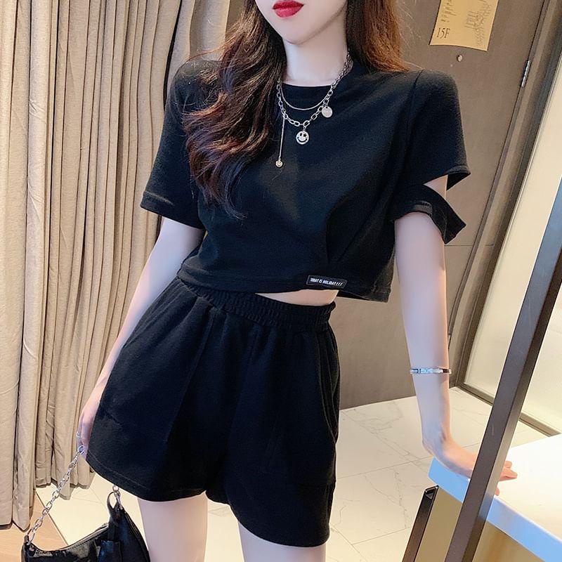 Set: Short-Sleeve Crew Neck Plain Cutout Crop T-Shirt + High Waist Zip Detail Shorts Product Image