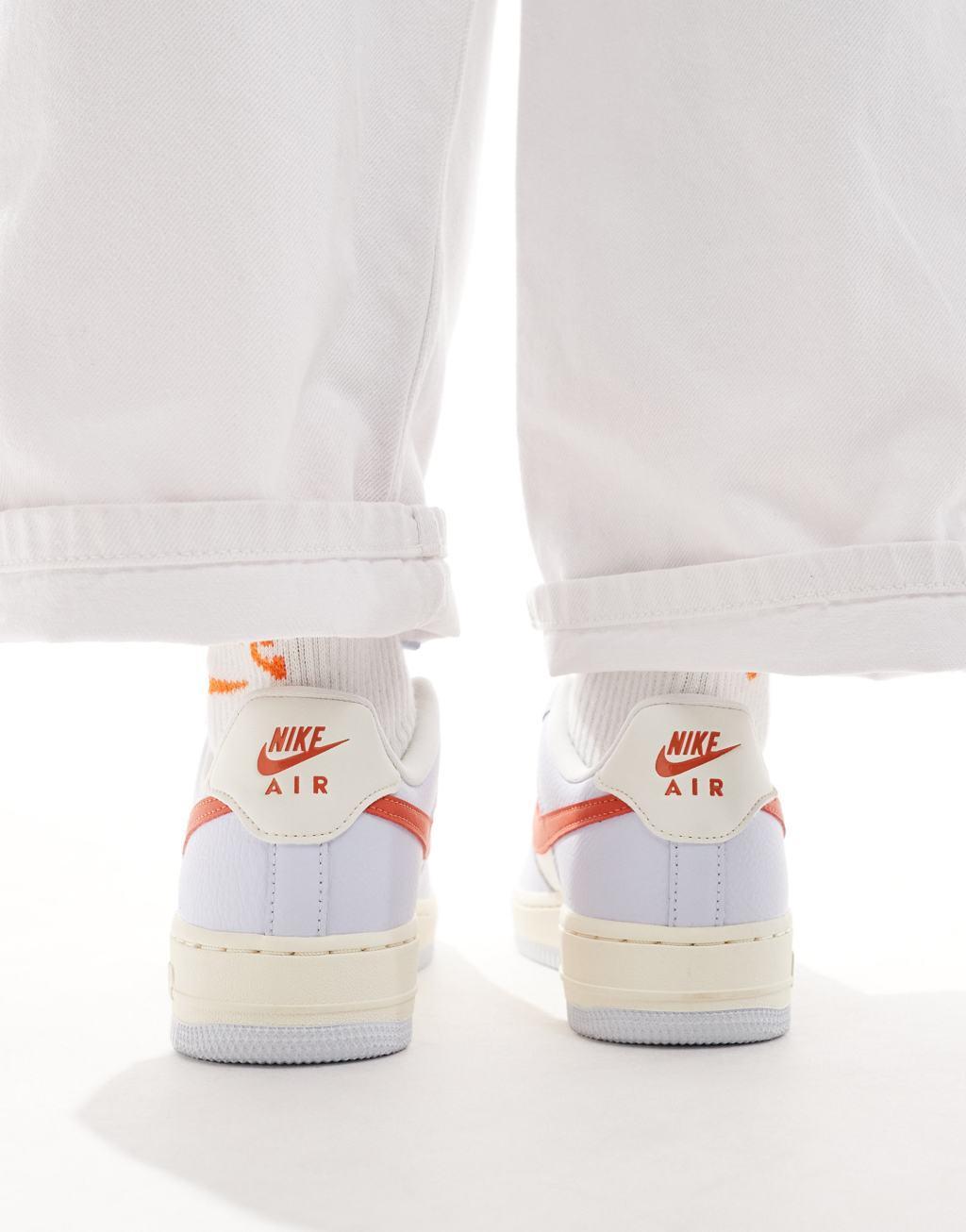 Nike Air Force 1 '07 sneakers in gray and orange Product Image