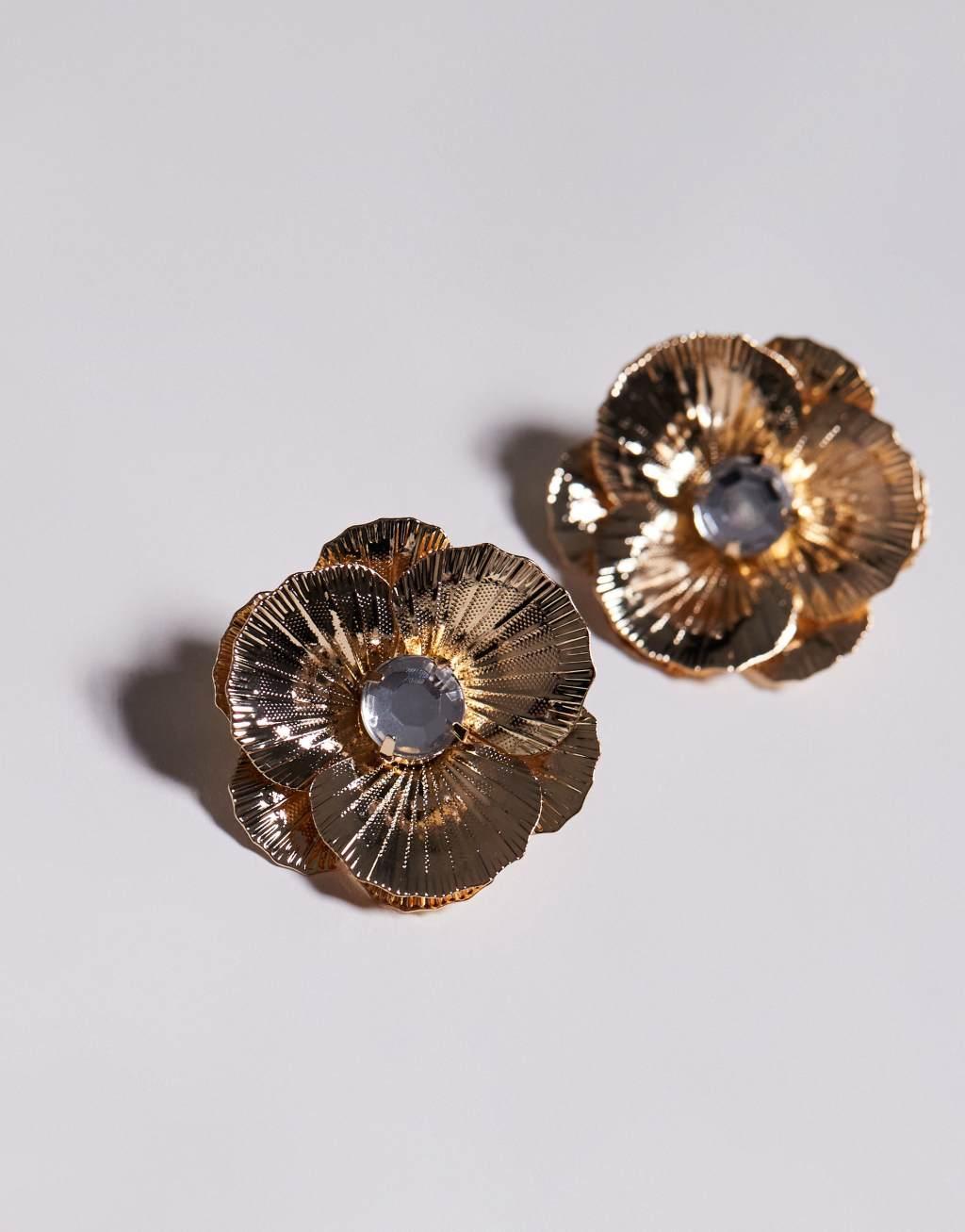 ASOS DESIGN stud earrings with flower and crystal design in gold tone Product Image