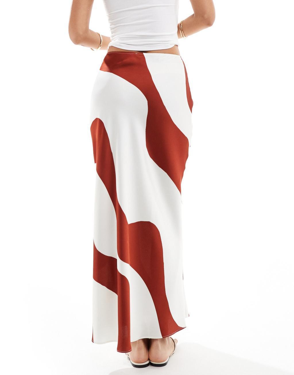 ASOS DESIGN satin bias midi skirt in red swirl print Product Image