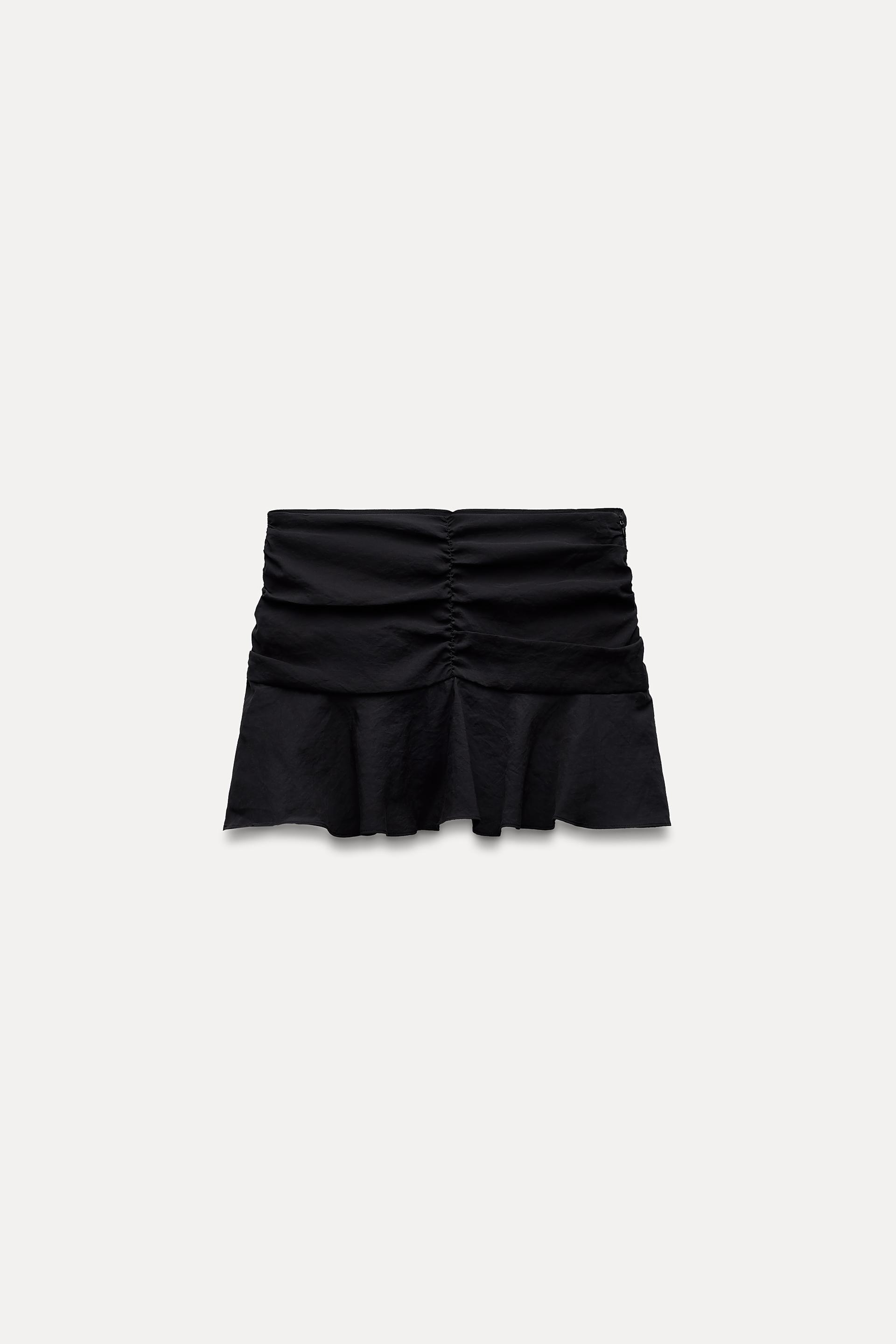 Skort with mid waist. Flounced hem. Side ruching detail. Side hidden in-seam zip closure. product image