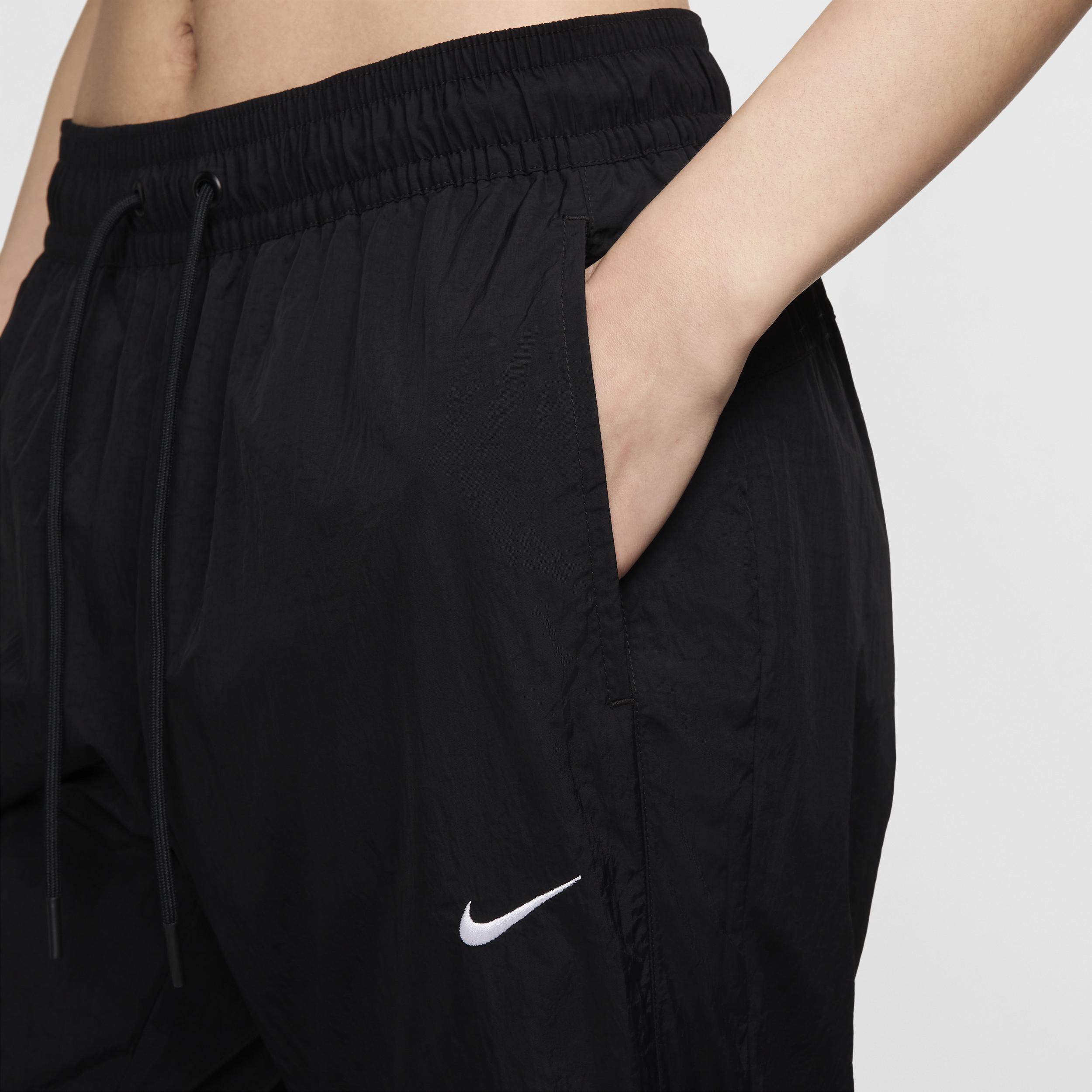 Womens Nike Sportswear Collection Mid-Rise Repel Zip Pants Product Image