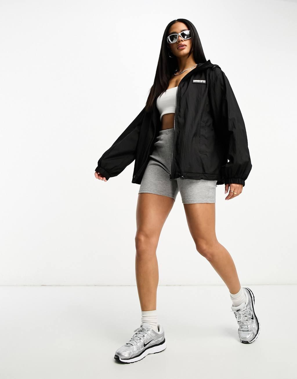 ASOS Weekend Collective rain coat in black Product Image