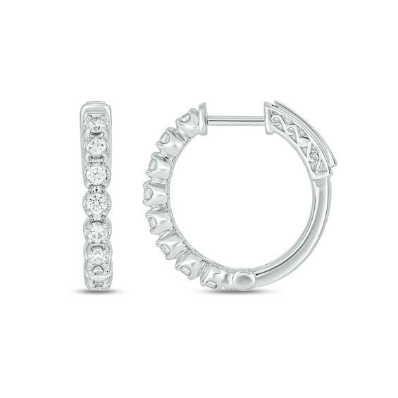 Men's 1/2 CT. T.w. Diamond Huggie Hoop Earrings in 10K White Gold Product Image