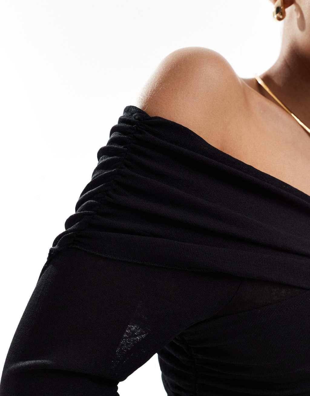 Pieces off the shoulder wrap long sleeved top in black Product Image