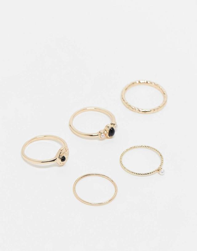 ASOS DESIGN Curve pack of 5 rings with black stone and faux pearl design in gold tone Product Image