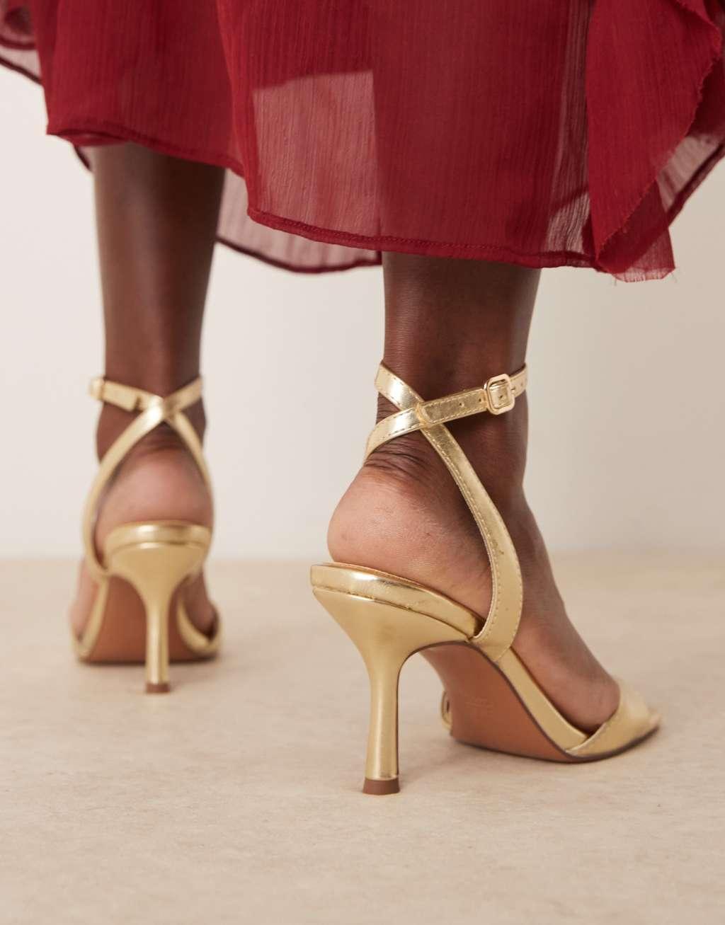 ASOS DESIGN Hollow barely there heeled sandals in gold Product Image