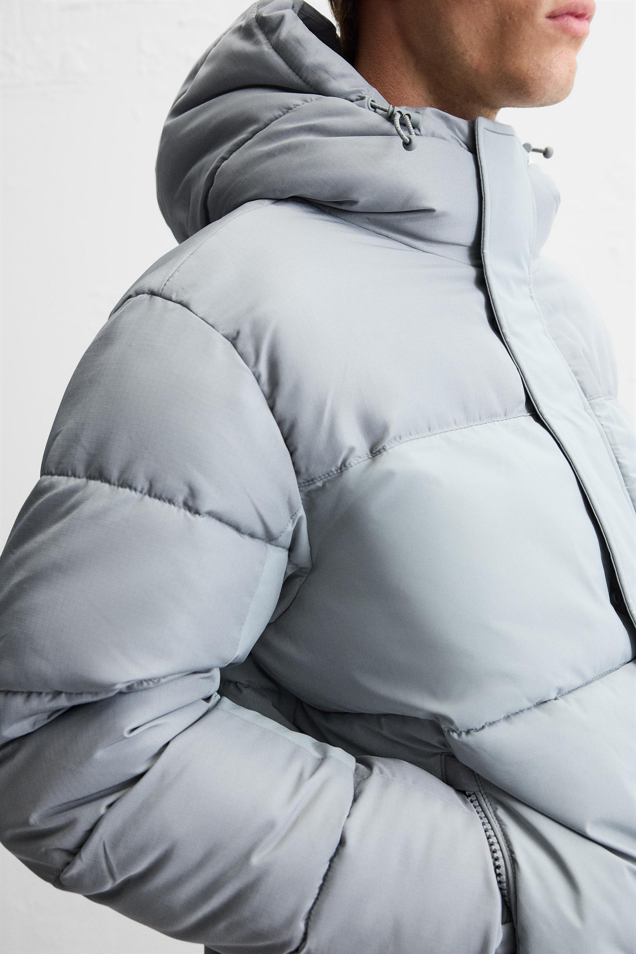 HOODED QUILTED JACKET Product Image